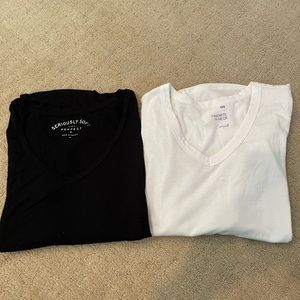 Women’s black and white v-neck t-shirts, size M, used, good condition